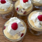 Group of individual trifles in glass dessert bowls.