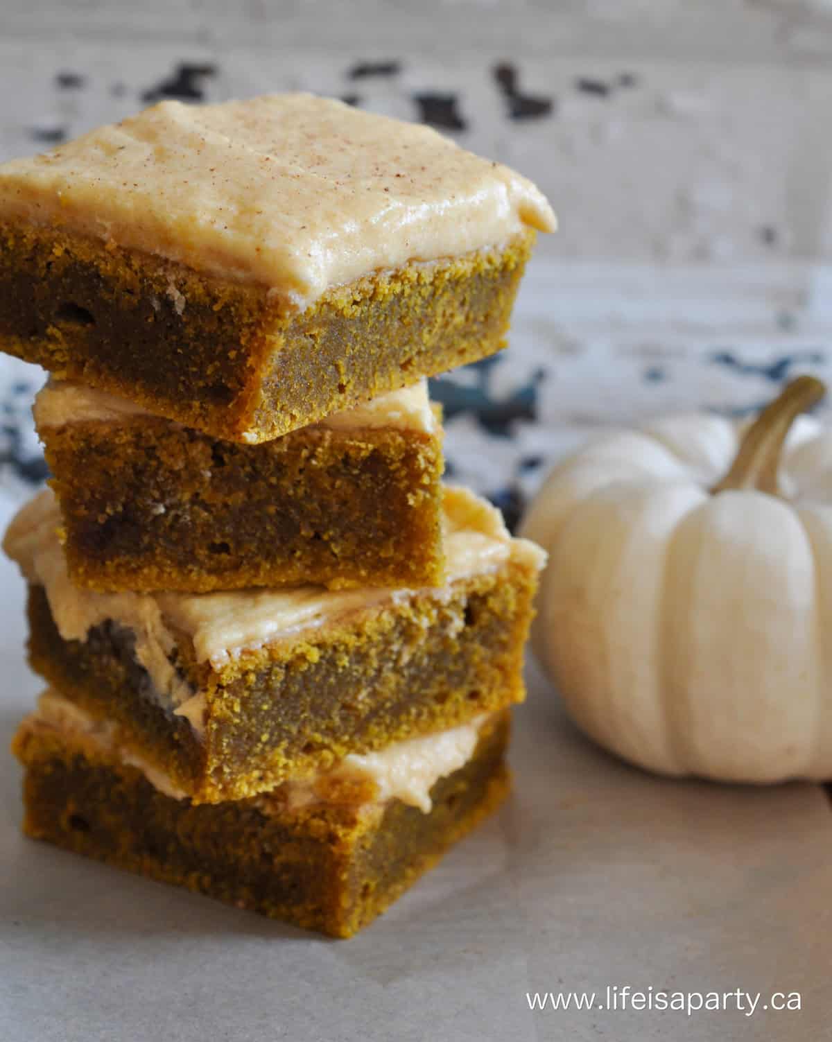 Pumpkin blondies with pumpkin frosting.