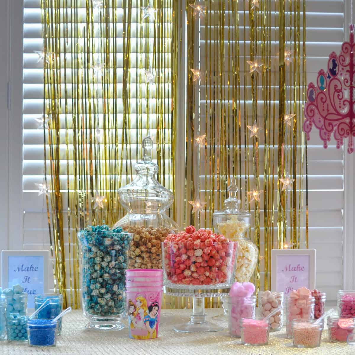 Sleeping beauty themed party with pink and blue popcorn bar, photo both, Princess breakfast and more.