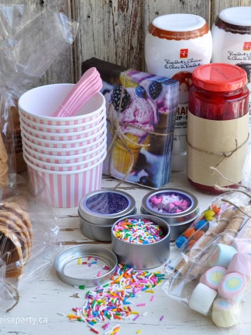 Ice cream sundae making kit gift basket.