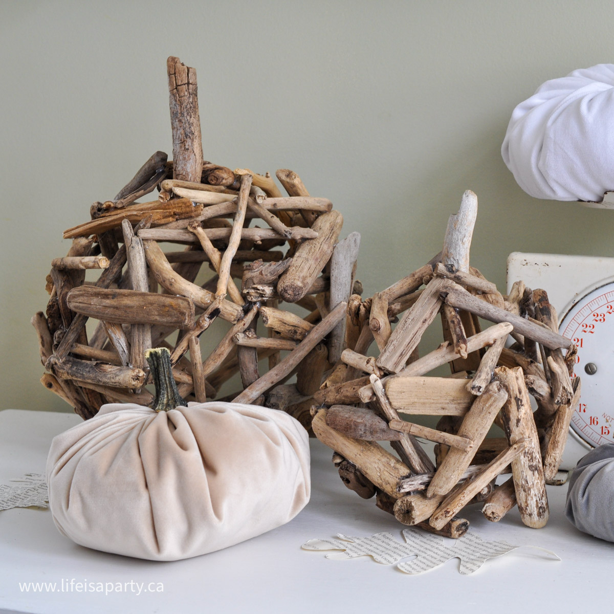 Two decorative driftwood pumpkins with a velvet pumpkin.