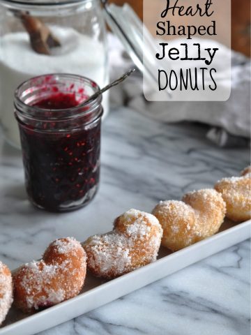 Bread Machine Jelly Donuts: mini heart shaped jelly donuts, with an easy to make bread machine dough. Perfect for Valentine's Day dessert, or anytime.