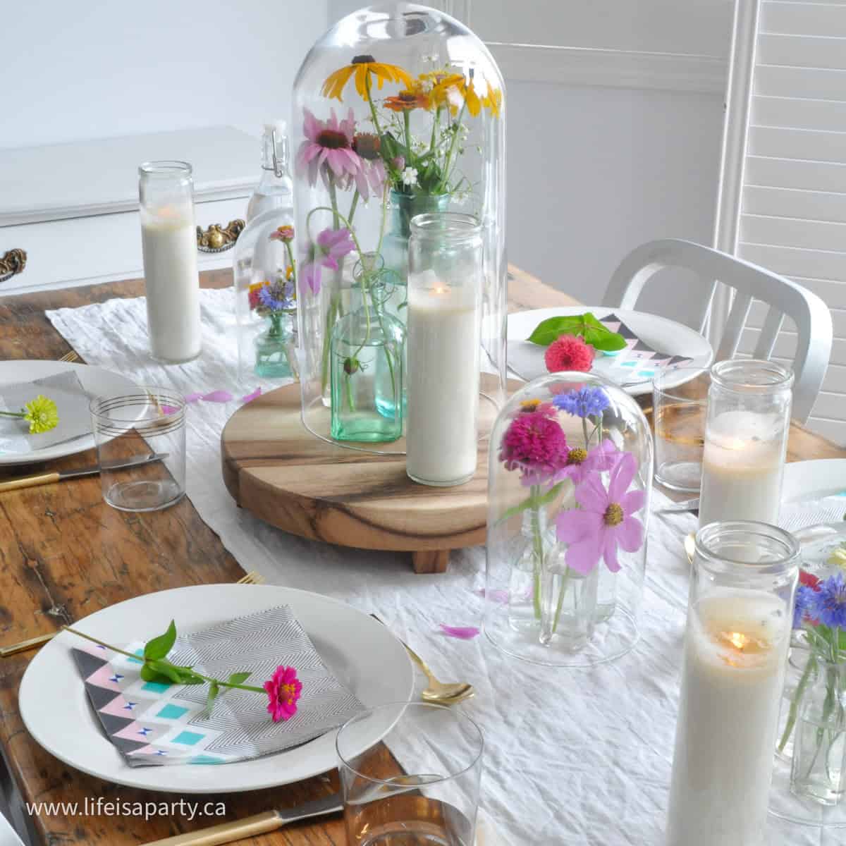 Summer table set with garden flowers.