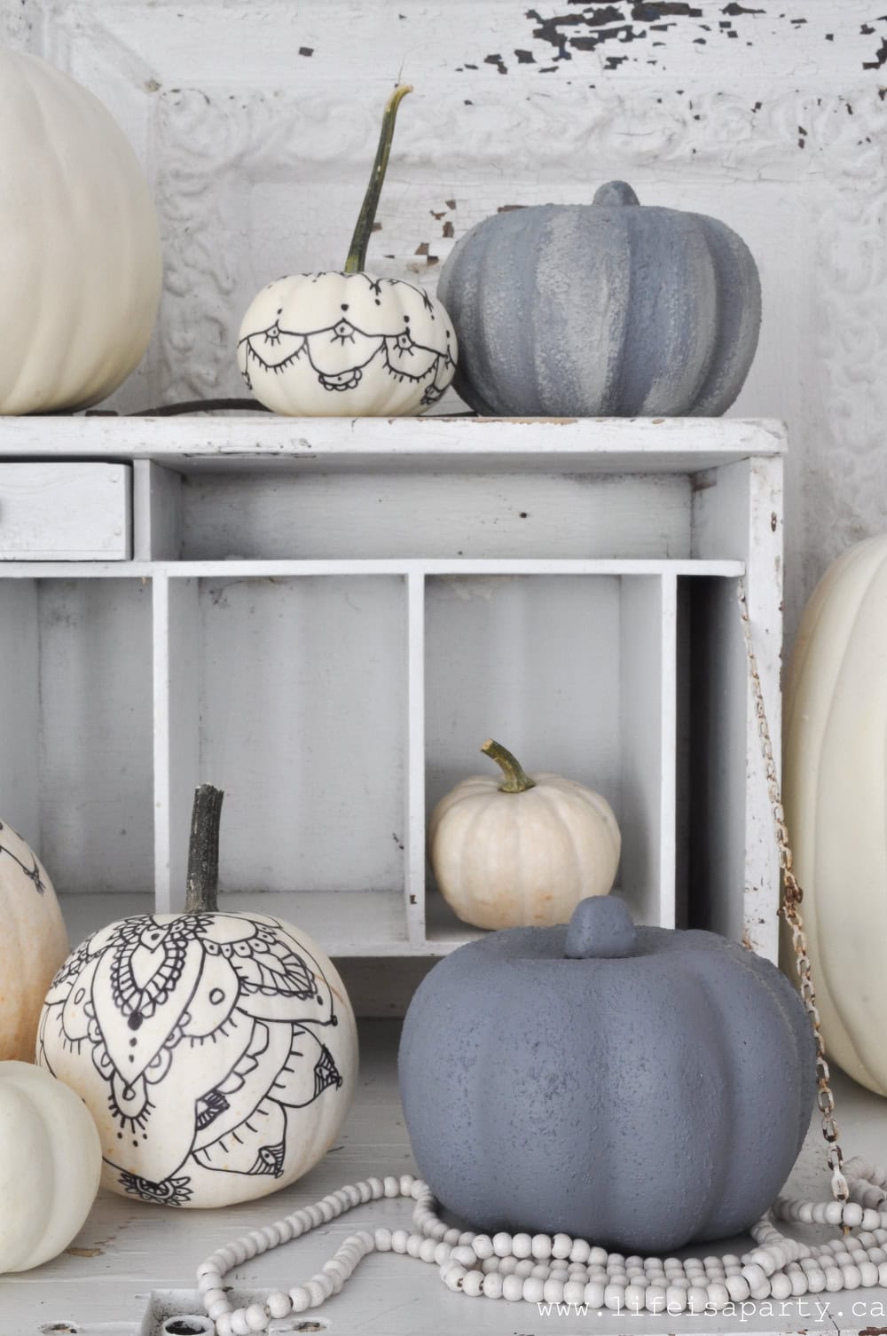 How to paint faux pumpkins to look like concrete.