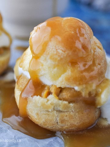 How to make pumpkin cream puffs with pumpkin filling and caramel sauce.