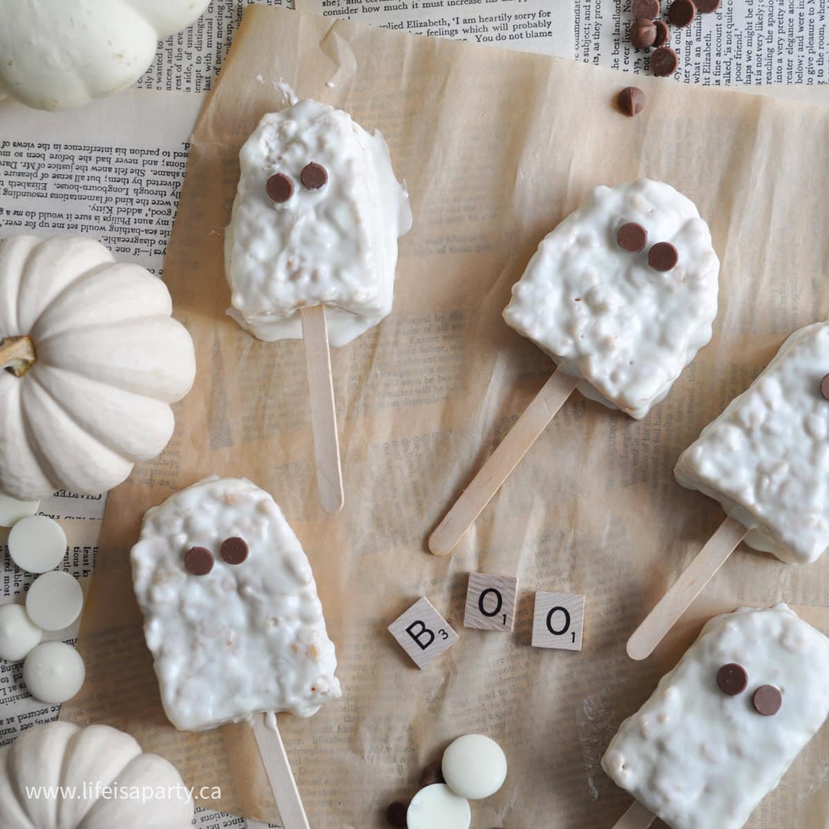 Halloween ghost shaped white chocolate covered Rice Krispie squares