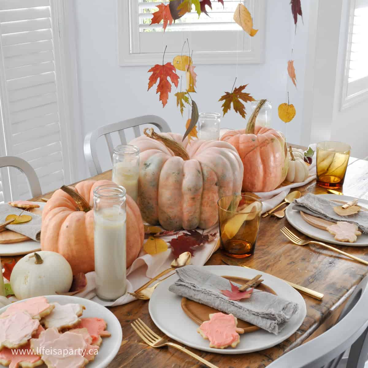 Fall leaf themed thanksgiving tablescape.