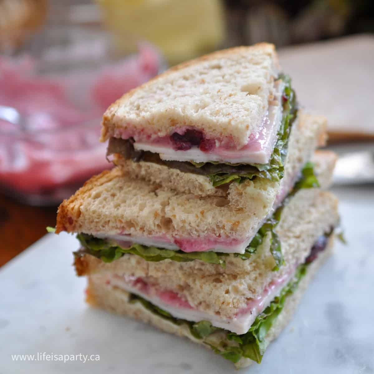 Turkey sandwich with cranberry mayo.