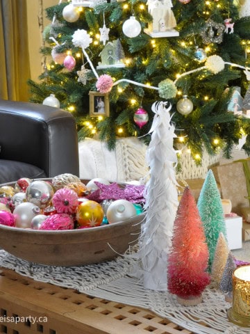 Pastel Christmas Living Room: Inspired by Anthropologie, with bottle brush Christmas trees, mercury glass, vintage ornaments, macrame, and pastel colours.