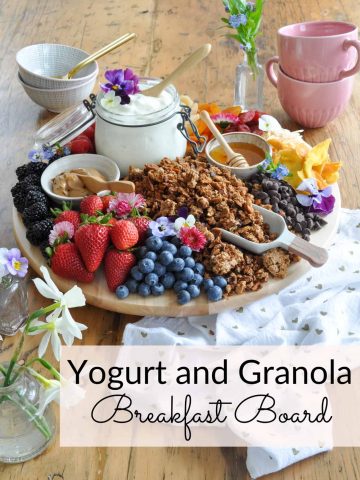Yogurt and Granola Parfait Breakfast Board Ideas: perfect for entertaining, yogurt charcuterie board with fresh fruit, dried fruit, and more.