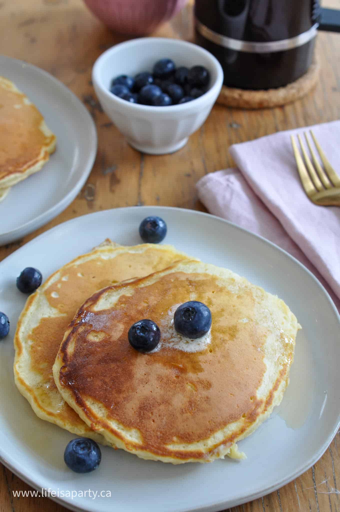 pancakes with fresh blueberries on top