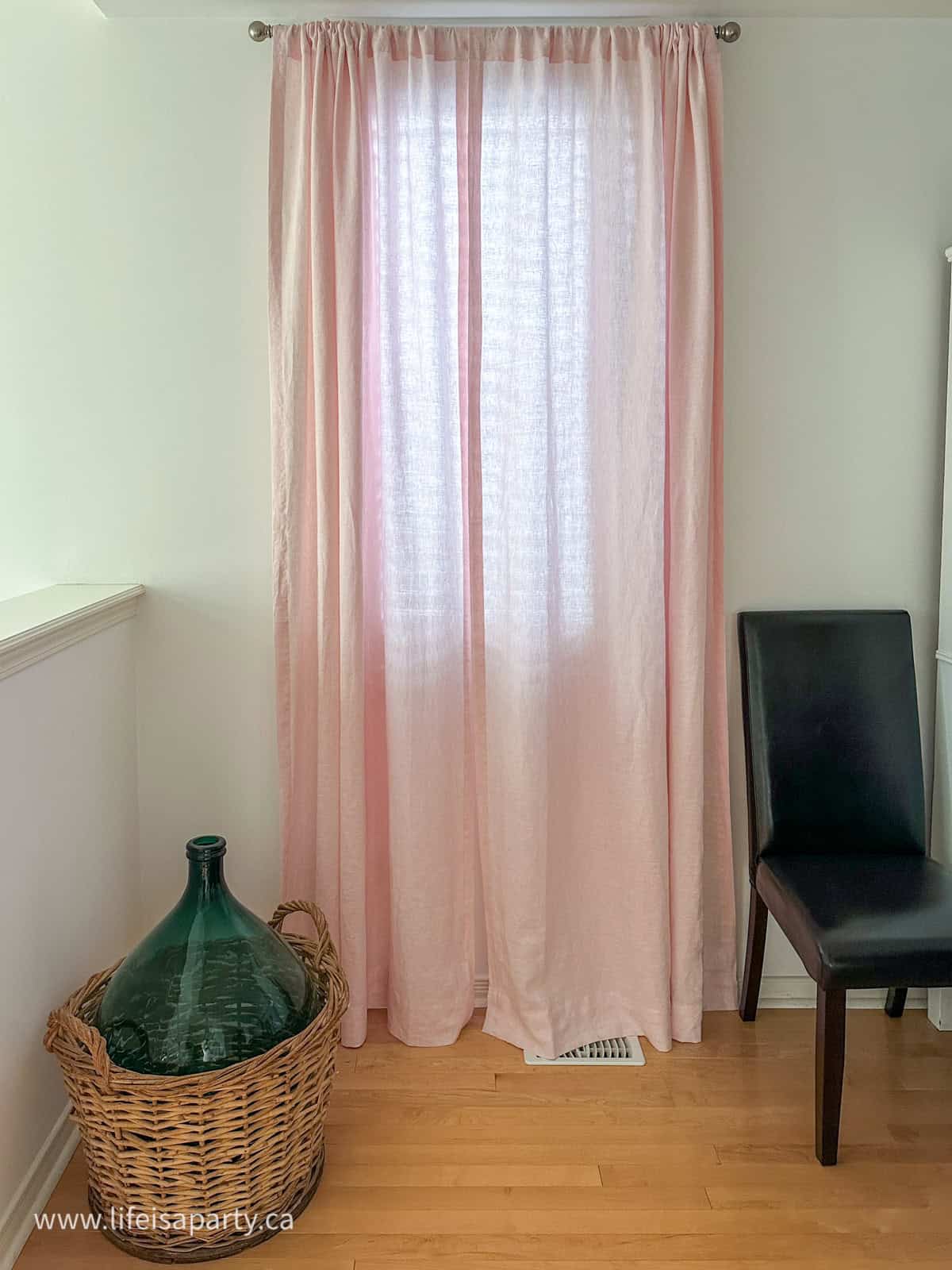 Pink linen curtains.