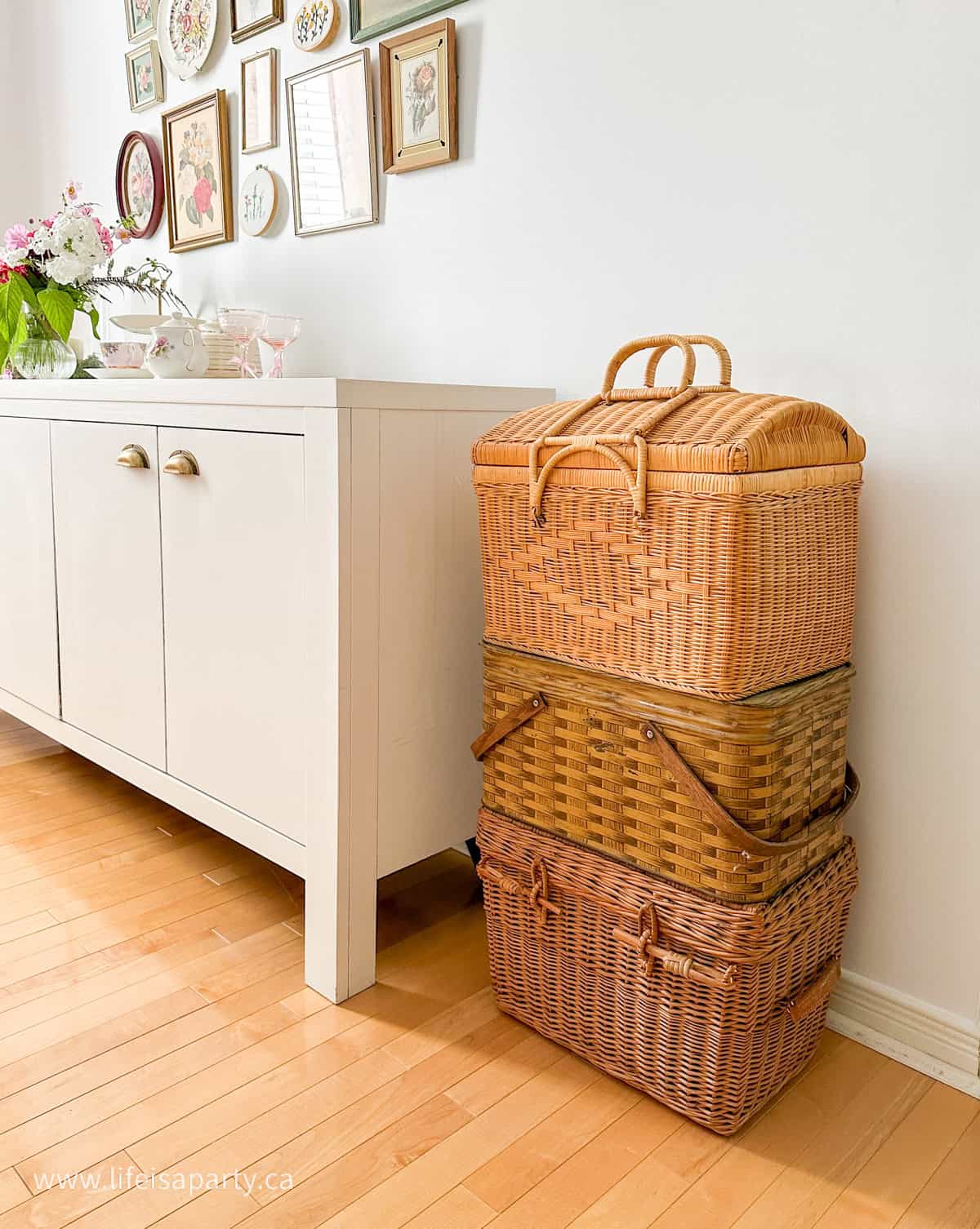 Stack of vintage picnic baskets.