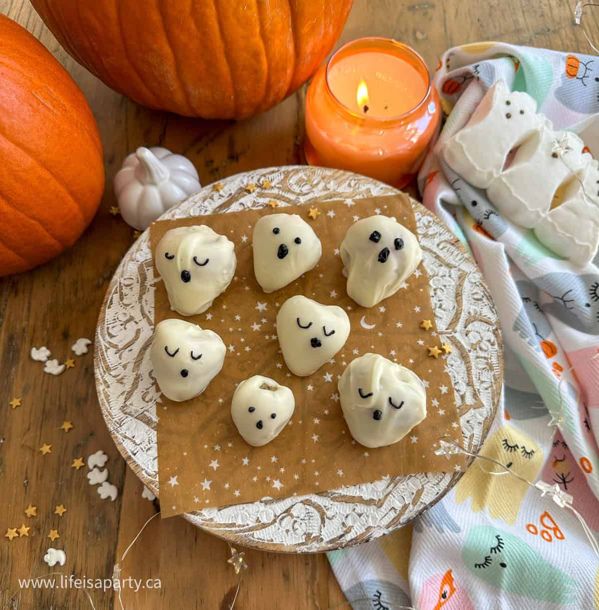 Chocolate dipped strawberry ghosts.