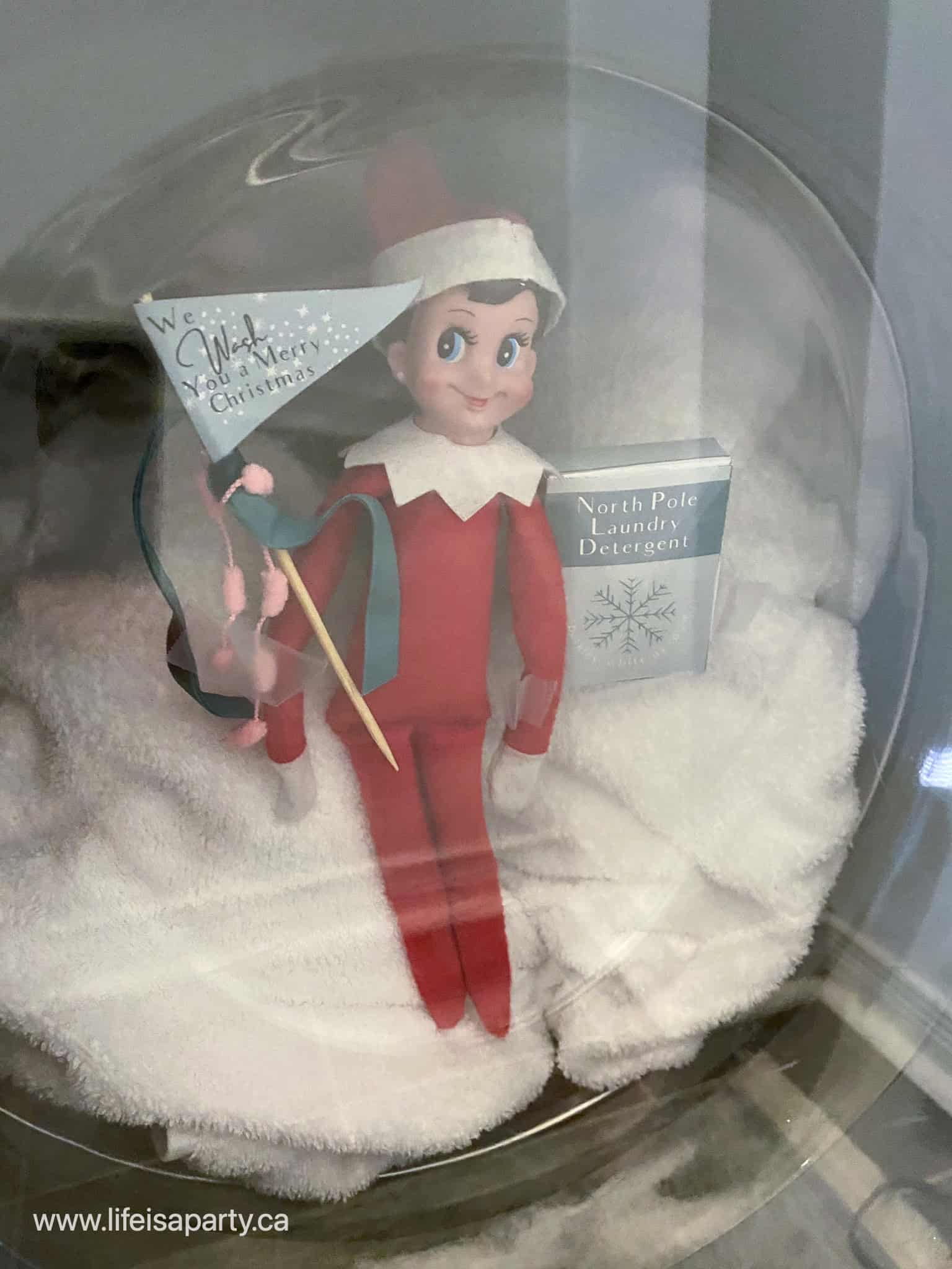 Elf on the shelf in a washing machine and free mini laundry printables.